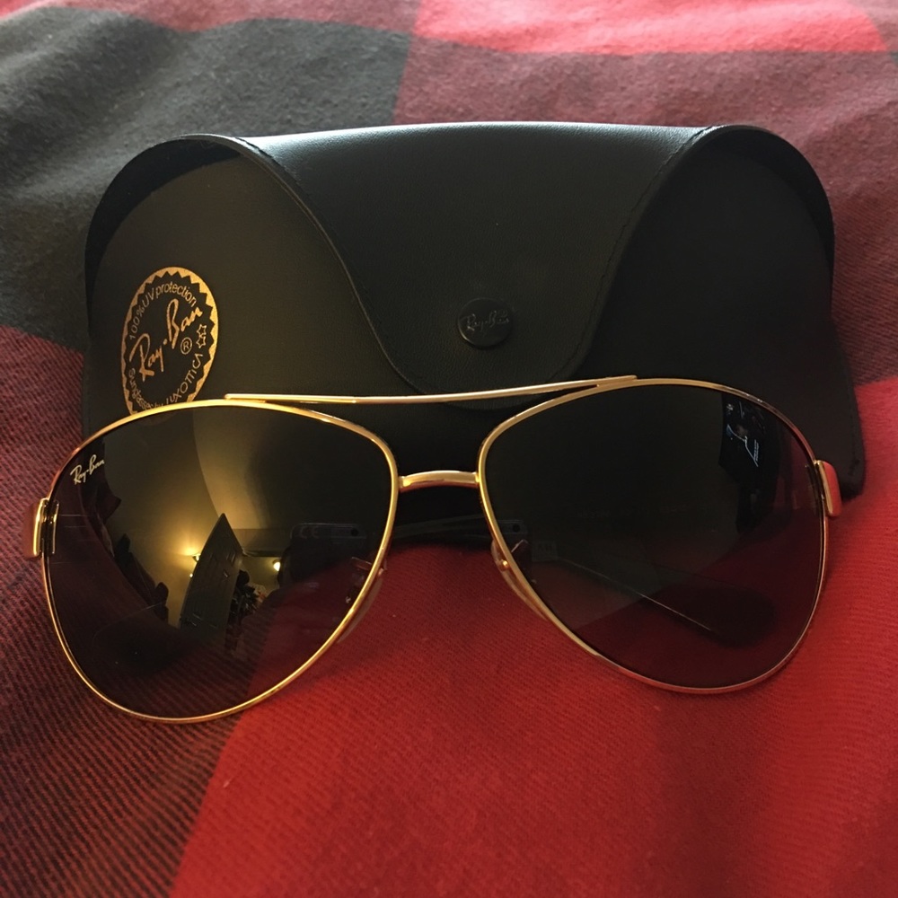 Ray•Ban aviator sunglasses.